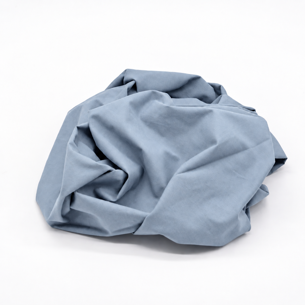 Baumwollstoffe vers. Farben in der Variante Rauchblau auf hellem Hintergrund.